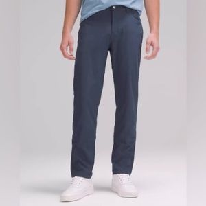 Lululemon ABC Pant. 33” waist; 32” inseam. Dark blue.